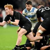 Finlay Christie of New Zealand passes the ball during the Rugby World Cup semi-final win over Argentina at the Stade de France. (Photo by Mike Hewitt/Getty Images)