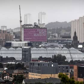 The bank, which now has a base in Glasgow, has lent to Bruntwood SciTech to acquire and redevelop the city's Met Tower, famous for its People Make Glasgow signage. Picture: Andy Buchanan/AFP via Getty Images.