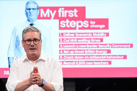 With rolled-up sleeves, Keir Starmer gets down to the job of unveiling his election pledges, a look and a move which drew comparisons with Tony Blair (Picture: Leon Neal/Getty Images)