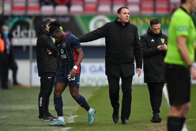 Ross County manager Malky Mackay with Joseph Hungbo against St. Mirren. (Photo by Ross MacDonald / SNS Group)