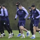 Hibs train in the wind and rain ahead of facing Livingston on Saturday.