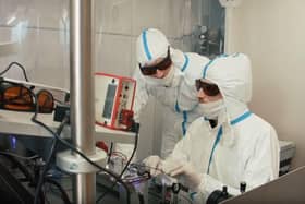 UniKLasers engineers work on the Solo 640 – the only single frequency DPSS red laser with 1000 mW output power on the market.