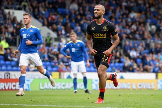 A happy Kemar Roofe goes off to celebrate after scoring from the penalty spot as Rangers came from behind to beat St Johnstone. Picture: SNS