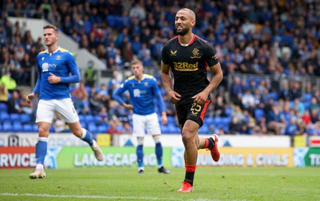 A happy Kemar Roofe goes off to celebrate after scoring from the penalty spot as Rangers came from behind to beat St Johnstone. Picture: SNS