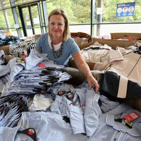 Sheena Hales sorts out clothing donations at the RBS Conference Centre at Gogarburn.