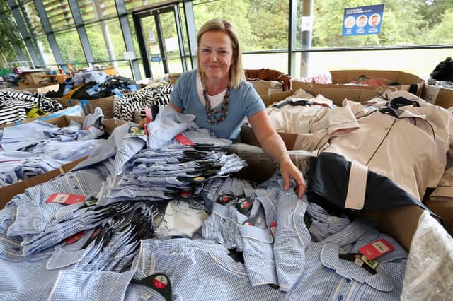 Sheena Hales sorts out clothing donations at the RBS Conference Centre at Gogarburn.