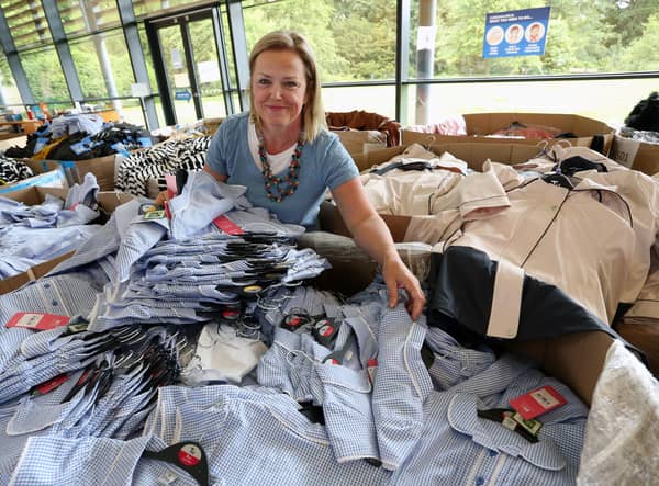 Sheena Hales sorts out clothing donations at the RBS Conference Centre at Gogarburn.