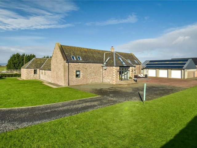 Front of property with garage.