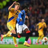 Rangers striker Fashion Sakala battles with Brondby captain Andreas Maxso during the Europa League match between the teams at Ibrox a fortnight ago. (Photo by ANDY BUCHANAN/AFP via Getty Images)