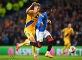 Rangers striker Fashion Sakala battles with Brondby captain Andreas Maxso during the Europa League match between the teams at Ibrox a fortnight ago. (Photo by ANDY BUCHANAN/AFP via Getty Images)