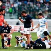 Scotland's Rory Sutherland celebrates the grounded Ewan Ashman's first try against Argentina. (Photo by Pablo Gasparini/AFP via Getty Images)