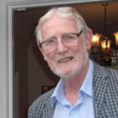 Dr Neville Belton