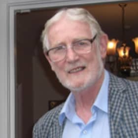 Dr Neville Belton