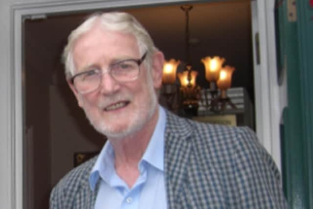 Dr Neville Belton