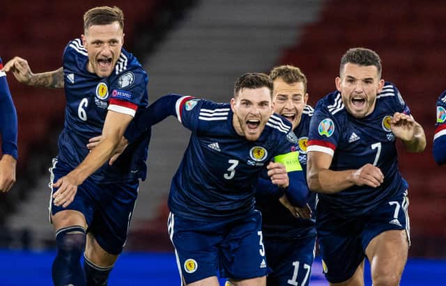 Scotland players celebrate after the penalty shoot-out victory against Israel