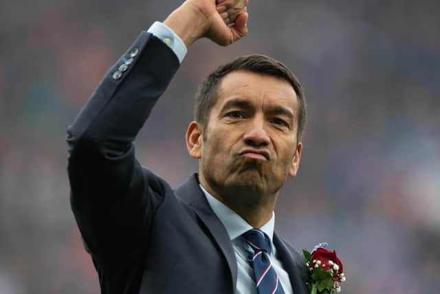 Rangers manager Giovanni van Bronckhorst celebrates the Scottish Cup final win over Hearts at Hampden.  (Photo by Sammy Turner / SNS Group)