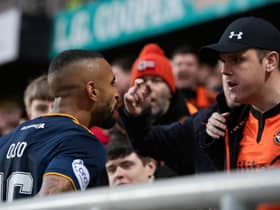 Aberdeen's Funso Ojo confronts a Dundee United fan leading to him being sent off (Photo by Mark Scates / SNS Group)