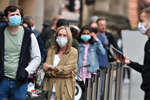 Face coverings have been compulsory in shops in Scotland since last Friday. Picture: John Devlin.