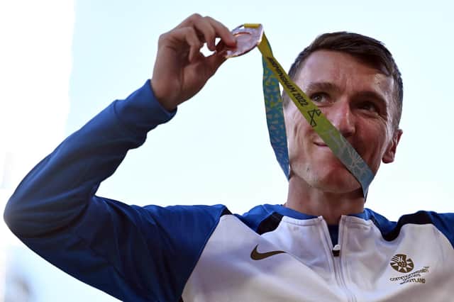 Bronze medallist Jake Wightman of Scotland during the medal ceremony for the men's 1500m final at the Commonwealth Games in Birmingham. (Photo by BEN STANSALL/AFP via Getty Images)