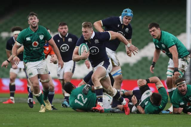 Scotland's wing Duhan van der Merwe runs on to score a second-half try.