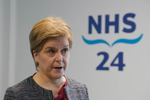 First Minister Nicola Sturgeon during her visit to open NHS 24's new centre at Hillington, Glasgow. Picture: Andrew Milligan/PA Wire