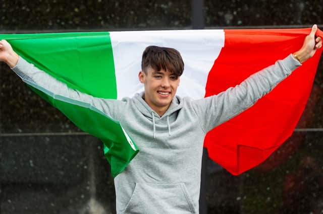 Hearts' Aaron Hickey is pictured as he departs for Italy ahead of his proposed move to Bologna.