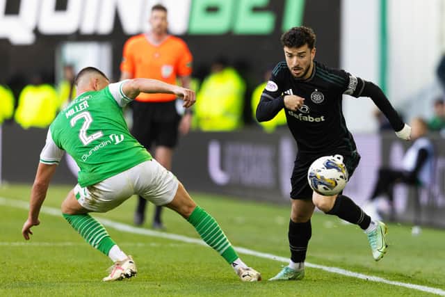 Celtic's Mikey Johnston skips past Hibs defender Lewis Miller during the goalless draw at Easter Road. (Photo by Mark Scates / SNS Group)