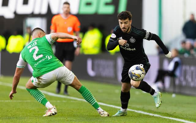 Celtic's Mikey Johnston skips past Hibs defender Lewis Miller during the goalless draw at Easter Road. (Photo by Mark Scates / SNS Group)