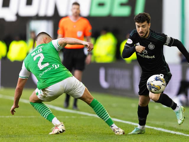 Celtic's Mikey Johnston skips past Hibs defender Lewis Miller during the goalless draw at Easter Road.  (Photo by Mark Scates / SNS Group)