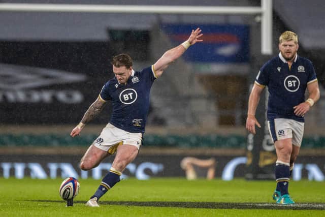 Scotland captain Stuart Hogg unleashes a long-range kick during the win over England at Twickenham. Picture: Craig Williamson/SNS