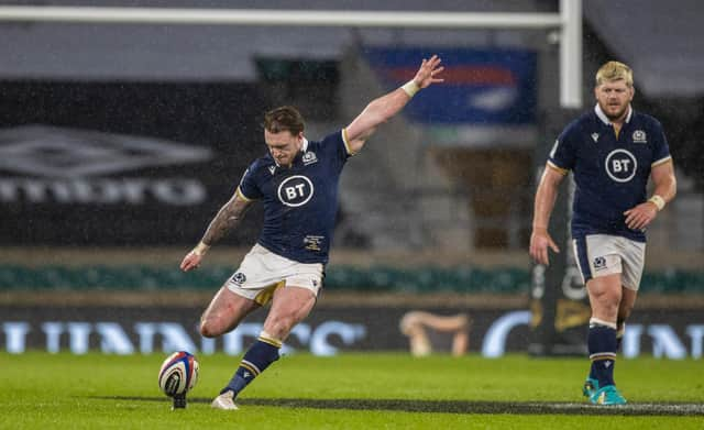 Scotland captain Stuart Hogg unleashes a long-range kick during the win over England at Twickenham. Picture: Craig Williamson/SNS