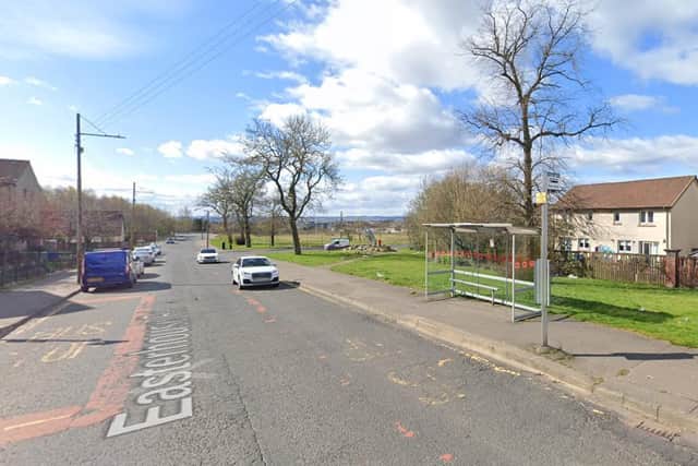 The woman was standing at the bus stop on Easterhouse Road, near the junction with Aberdalgie Road, when a man approached her.