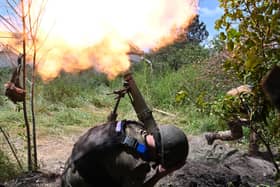 Ukrainian marines fire a mortar towards Russian positions in the village of Storozhevem, Donetsk region (Picture: Genya Savilov/AFP via Getty Images)