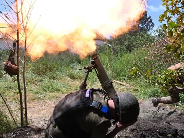 Ukrainian marines fire a mortar towards Russian positions in the village of Storozhevem, Donetsk region (Picture: Genya Savilov/AFP via Getty Images)