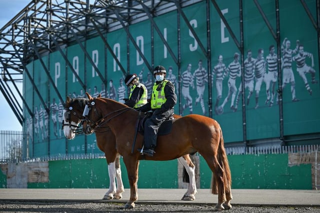Police Scotland officers were forced to disperse “small groups” of football fans that gathered around Glasgow, after Celtic’s one-all draw against Rangers this afternoon. (Photo by Jeff J Mitchell/Getty Images)