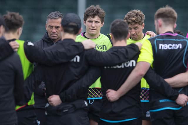 Franco Smith,  left, with players Rory Darge and Domingo Miotti during a Glasgow Warriors open training session at Scotstoun this week. (Photo by Ross MacDonald / SNS Group)