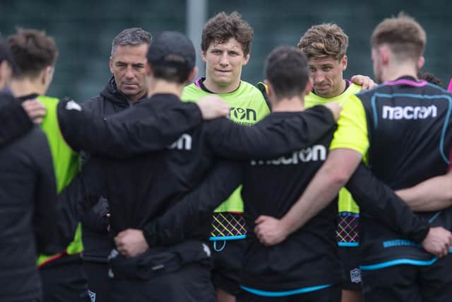 Franco Smith, left, with players Rory Darge and Domingo Miotti during a Glasgow Warriors open training session at Scotstoun this week. (Photo by Ross MacDonald / SNS Group)