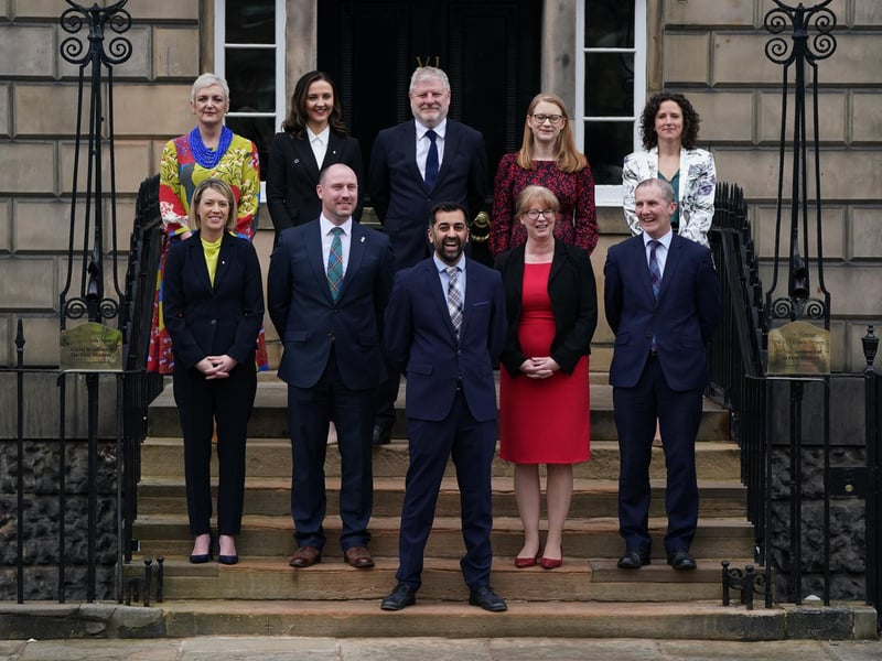 Newly elected First Minister of Scotland Humza Yousaf on the steps of Bute House, Edinburgh, with his cabinet after their first meeting. Picture date: Wednesday March 29, 2023.
