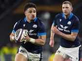 Sione Tuipulotu is flanked by Finn Russell during Scotland's win over England in the 2023 Six Nations opener at Twickenham. (Photo by Ross MacDonald / SNS Group)