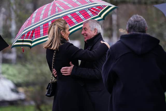 Sir Ian McGeechan greets Gabby Logan as they arrive at Melrose Parish Church for Doddie Weir's memorial service. Picture: Peter Summers/Getty Images