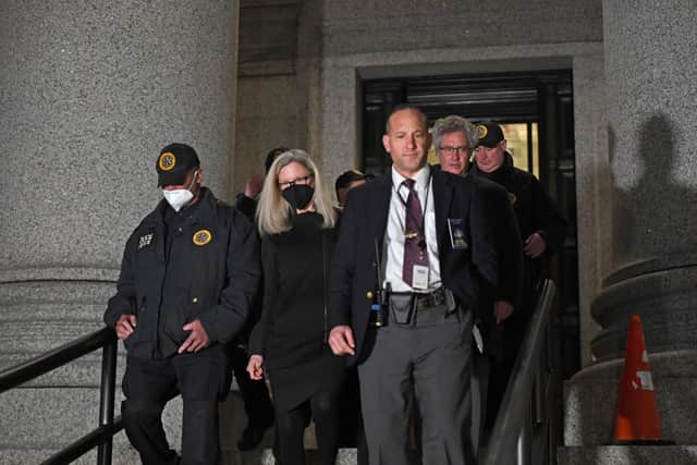Defense attorneys Laura Menninger (centre) and Jeffrey Pagliuca (middle right) leaving the federal courthouse in the Southern District of New York after British socialite Ghislaine Maxwell was convicted of helping American financier Jeffrey Epstein sexually abuse teenage girls.