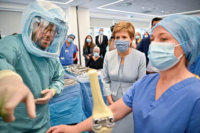 First Minister Nicola Sturgeon and Health Secretary Humza Yousaf launched the NHS recovery plan during a visit to the new national Centre for Sustainable Delivery (CfSD) at the Golden Jubilee Hospital. Photo by Jeff J Mitchell - Pool/Getty Images