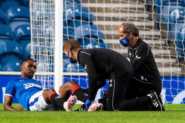Jermain Defoe receives treatment after being injured against Motherwell.