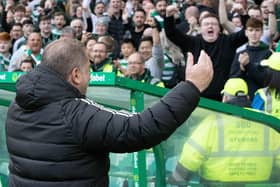 Celtic manager Ange Postecoglou takes the adulation of fans during a victory over Rangers.