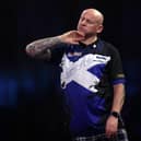 Alan Soutar reacts to a missed dart during his loss to Gabriel Clemens in the last 16 of the Cazoo World Darts Championship at Alexandra Palace. (Photo by Mike Owen/Getty Images)