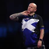 Alan Soutar reacts to a missed dart during his loss to Gabriel Clemens in the last 16 of the Cazoo World Darts Championship at Alexandra Palace. (Photo by Mike Owen/Getty Images)