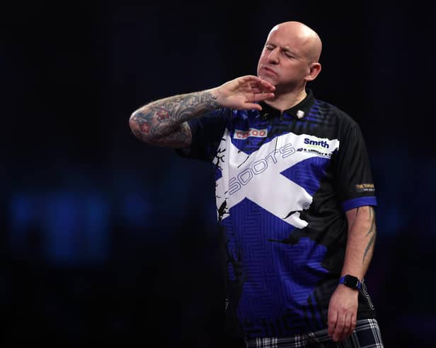 Alan Soutar reacts to a missed dart during his loss to Gabriel Clemens in the last 16 of the Cazoo World Darts Championship at Alexandra Palace. (Photo by Mike Owen/Getty Images)