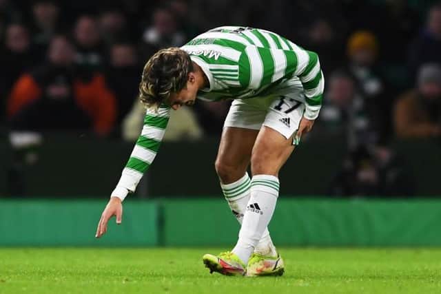 Celtic's Jota pulls up with a hamstring injury against Hearts. (Photo by Craig Foy / SNS Group)