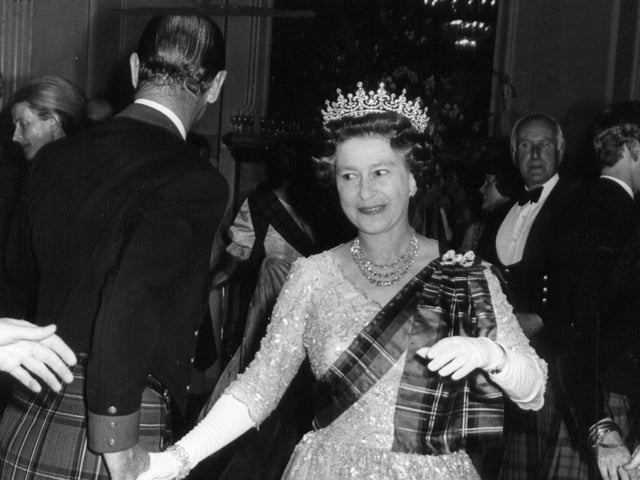 The Queen at the centenary ball of the Royal Scottish Pipers' Society in Edinburgh in 1982.