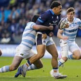 Sione Tuipulotu seems to have work to do but he took his man over the line with him for Scotland's opening try.
